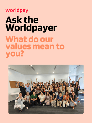 Salmon pink rectangle with text that says ‘Ask the Worldpayer. What do our values mean to you?’ Next to the text is a group photo.